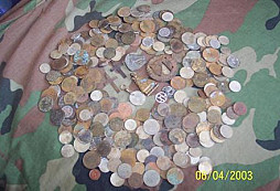 Nové fotografie šperků a mincí od George