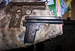 Zbraně a helma od Jirky