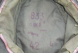 Hledání zakopaných zbraní, horský myslivec a kabát