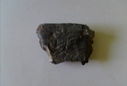 Plomby, knoflíky a záhadný kovový kámen