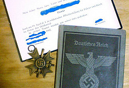 Arbeitsbuch a záslužný kríž