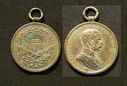 Medaile, odznáčky, svátostka