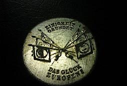 Postříbřený knoflík