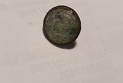 Knoflík se sklíčkem